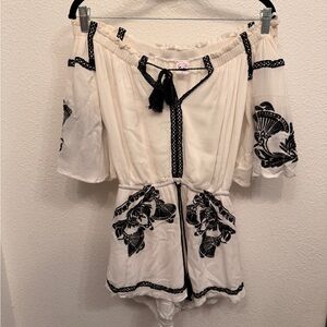 White and Black OTS embroidered tassel detail romper